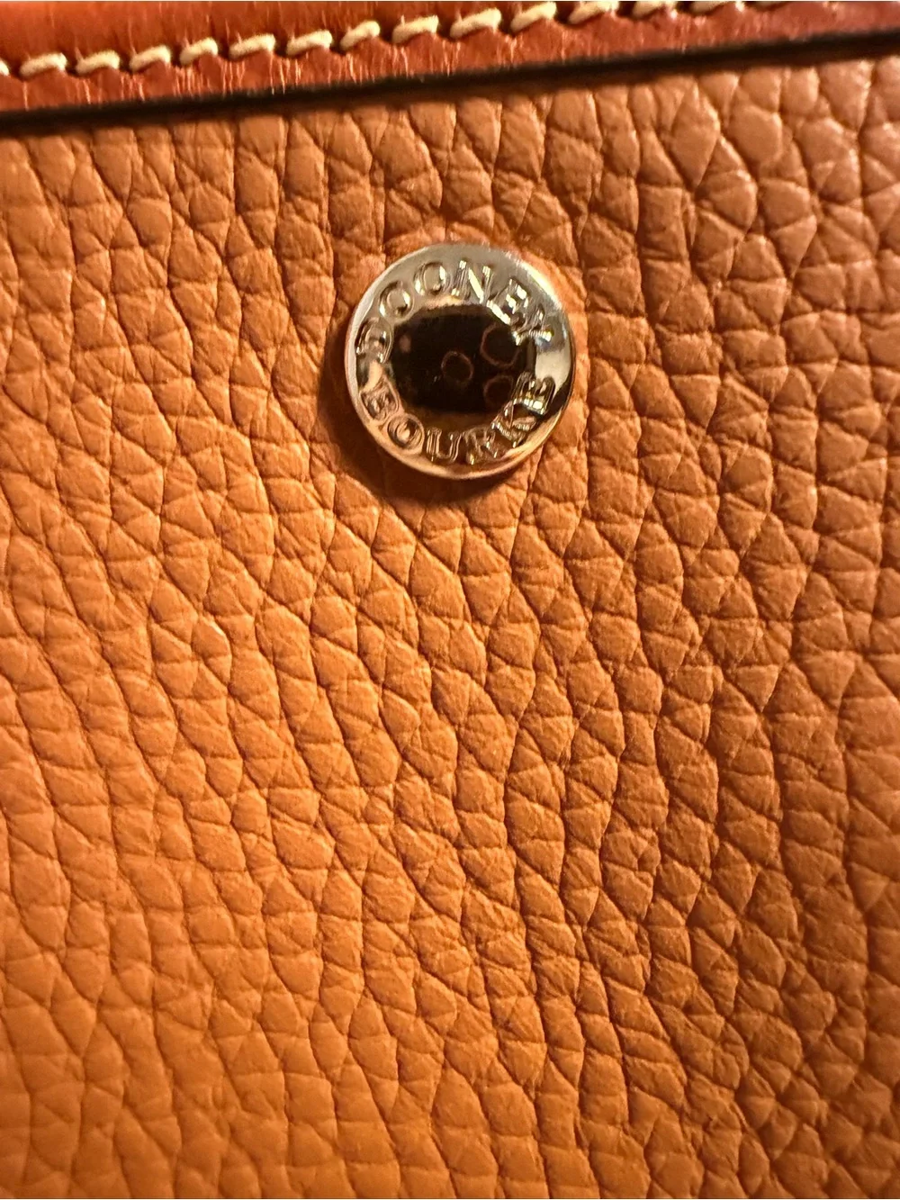 Dooney & Bourke never worn